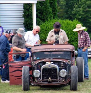 men looking at car