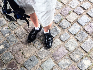 standing on cobblestone street